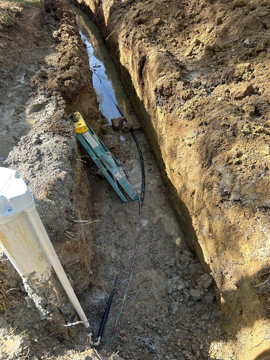 Trenching for Mike Wilcoxson Excavating & Well Drilling in Pierceton,  IN