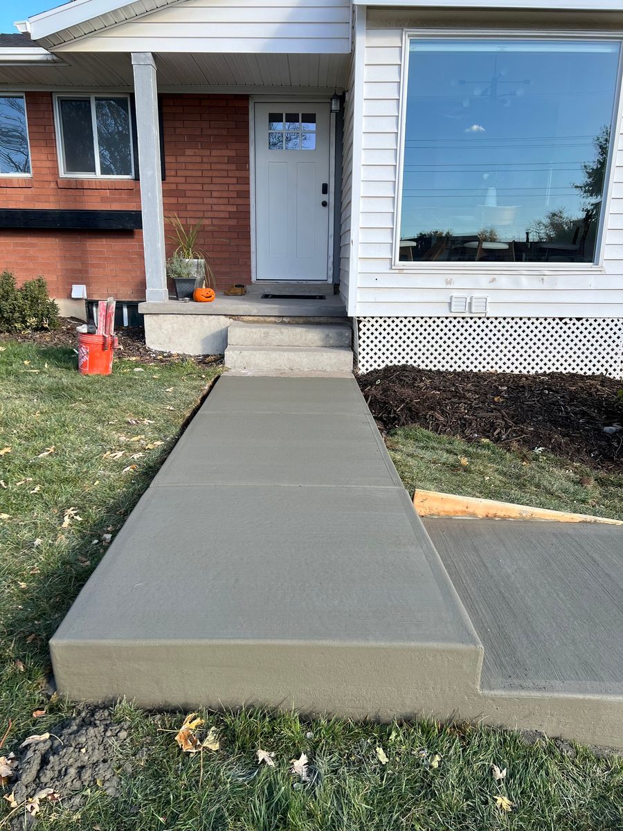 Sidewalk Installation for TNT Concrete and Construction in Roy, UT