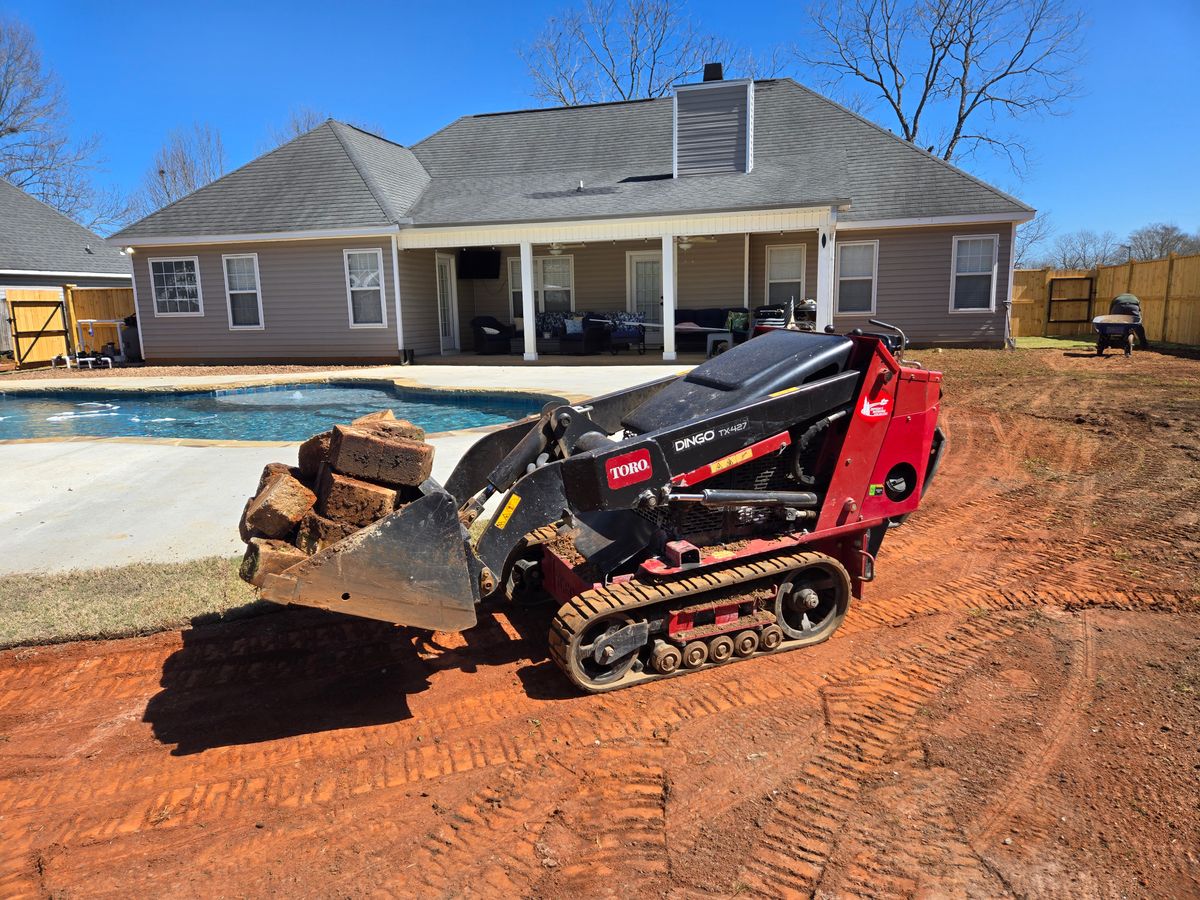 Mini skid steer for Zepeda's Mowing in Fort Valley, GA