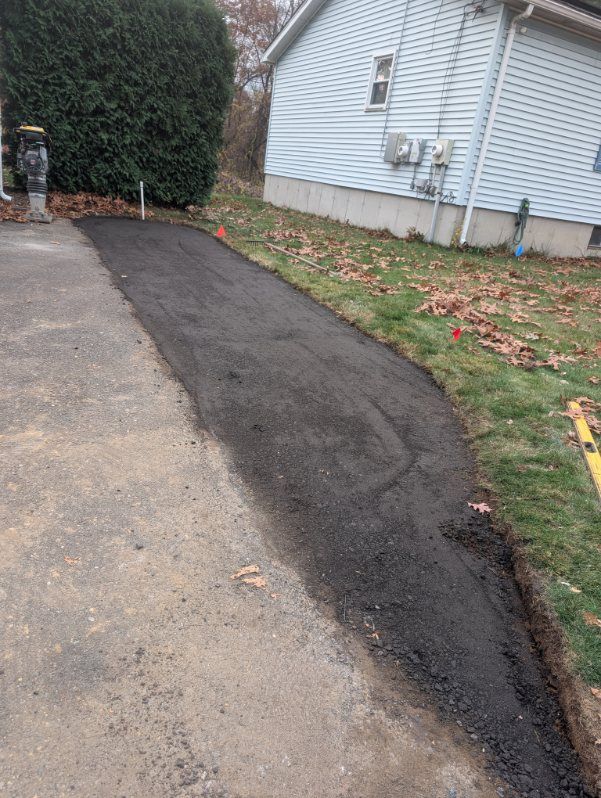Mulch Installation for Evolution Earthscapes, LLC in Ludlow, MA