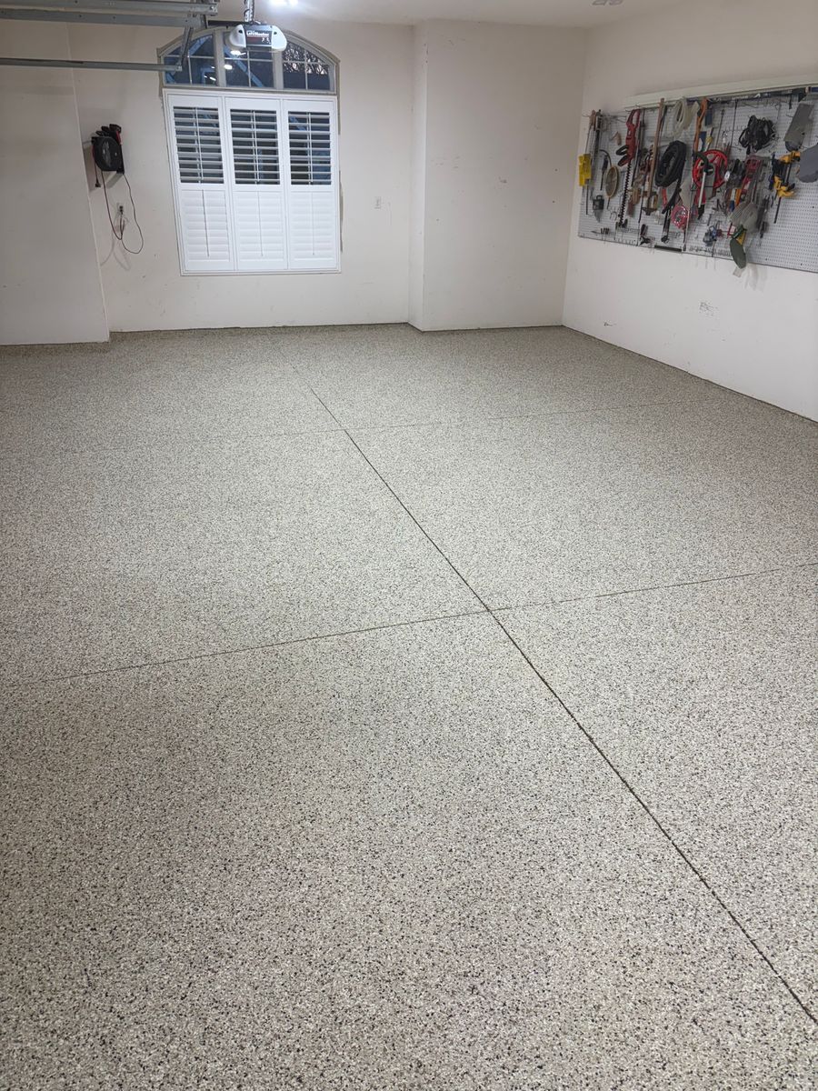 Installation of Beautiful Garage Floors for Drury Concrete Coatings in St. Charles, MO