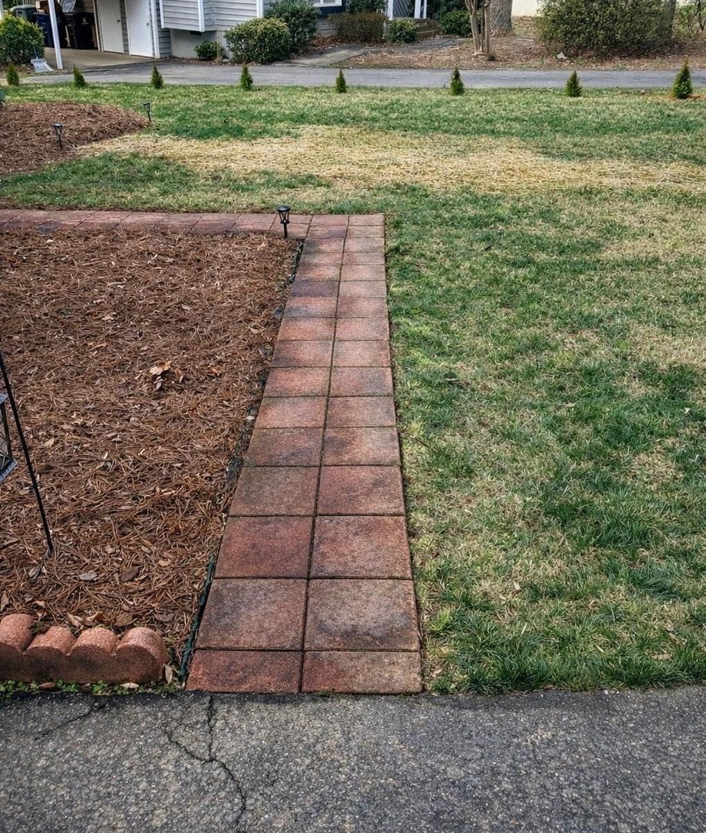 Mulching and pine needling for Holloway Yard Company in Greensboro, NC