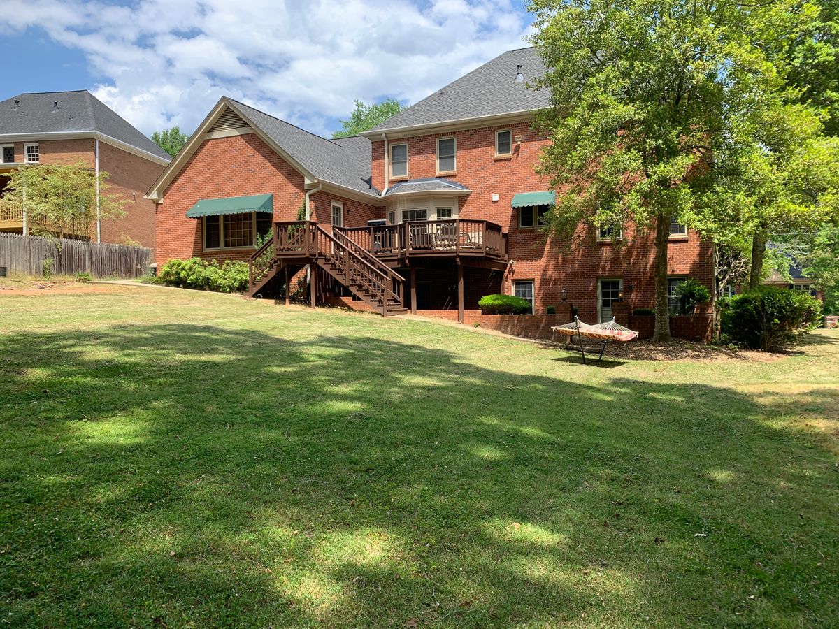Mowing for Clark's Cuts Lawn Care in Lilburn, GA