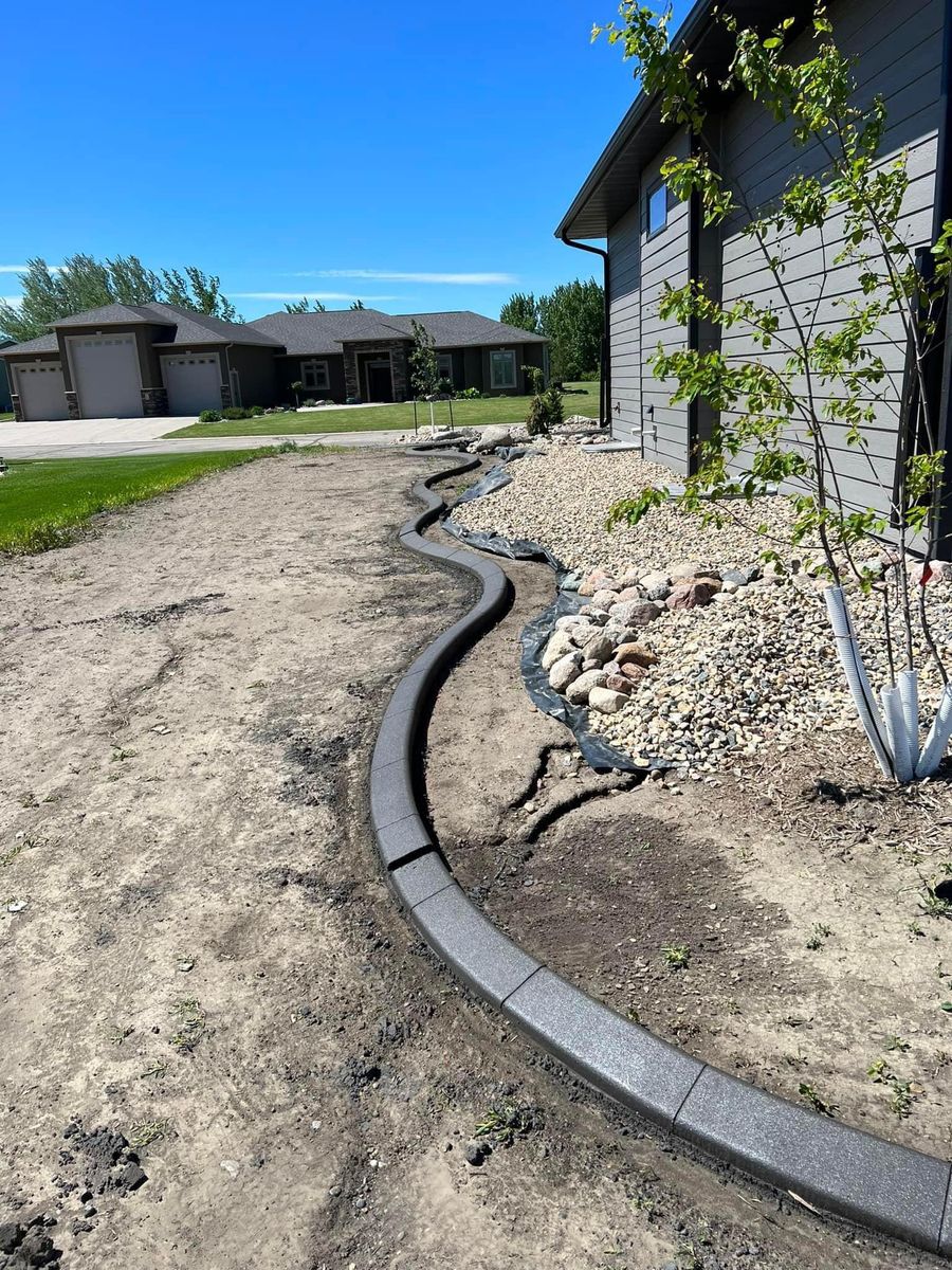 Curbing for Dust Till Dawn Lawn in London, Kentucky