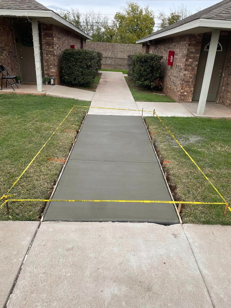 Commercial ADA Ramps, Sidewalk, Parking Bollards w/Signage, Curb/Gutter, Parking Lot Repair for Crete-Fleet in Abilene, TX