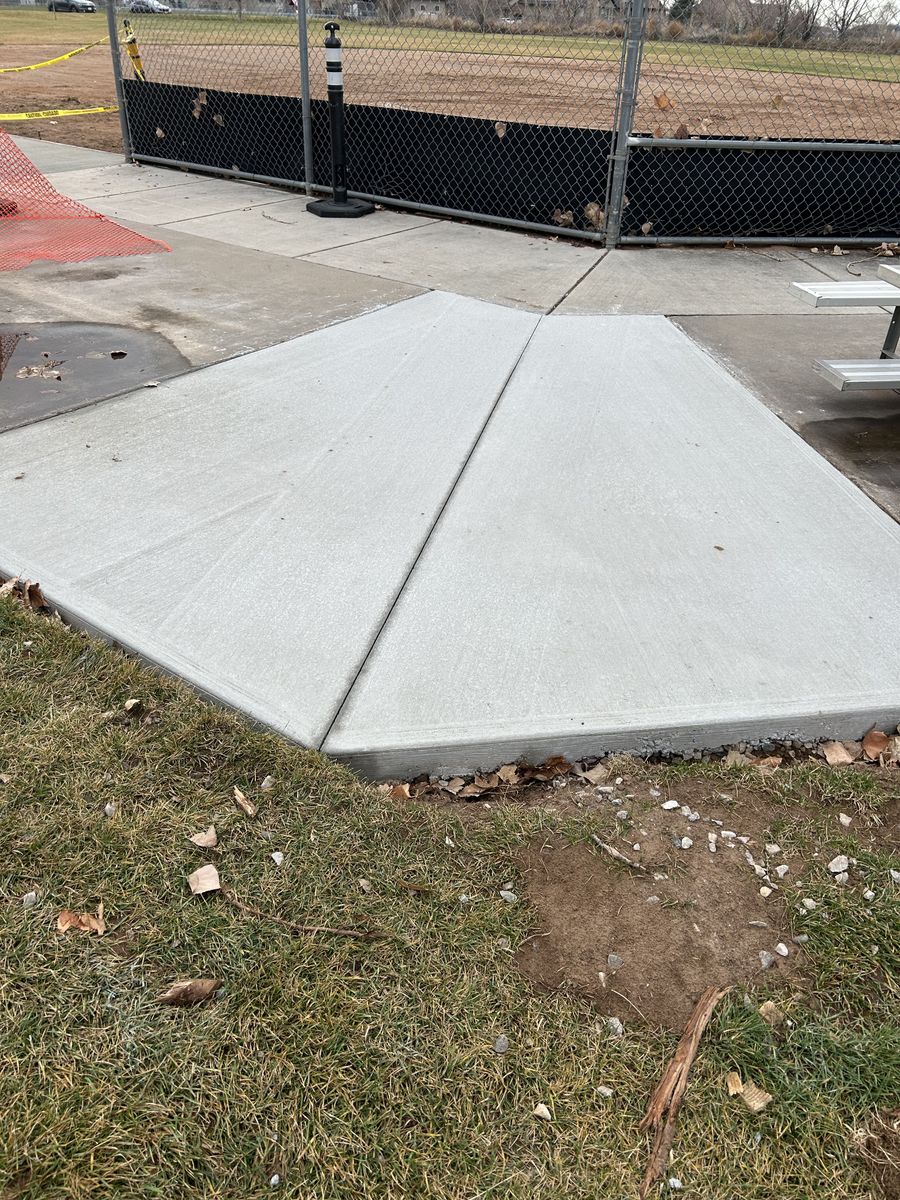 Sidewalk Installation for TNT Concrete and Construction in Roy, UT