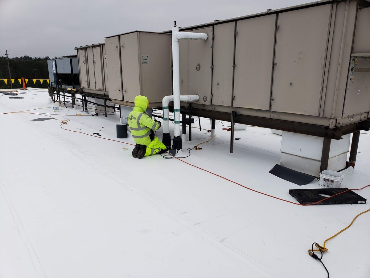 Fabric reinforced coating system for Flat Roofs. for Watershed Commercial Roofing in Grand Rapids, MI