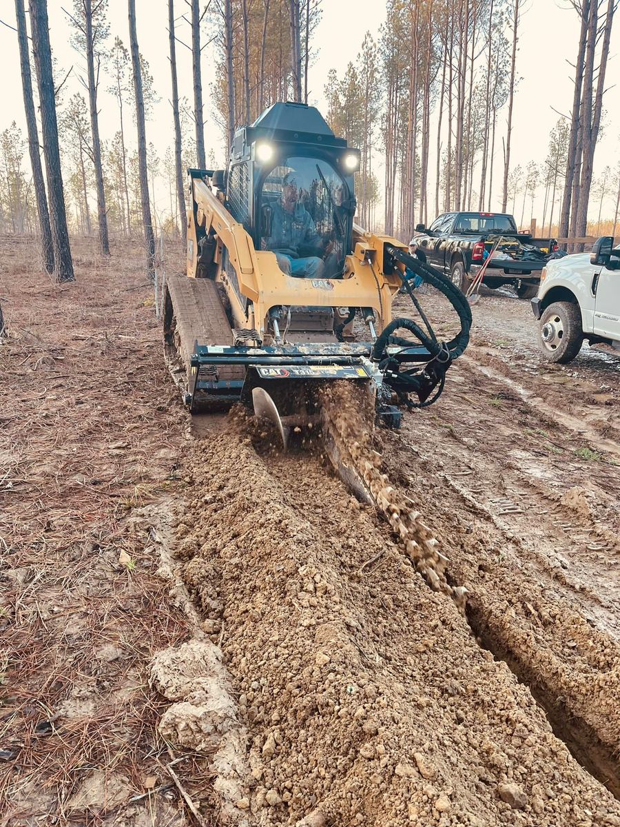 Trenching for Mountain Land Services LLC. in Oneida, TN