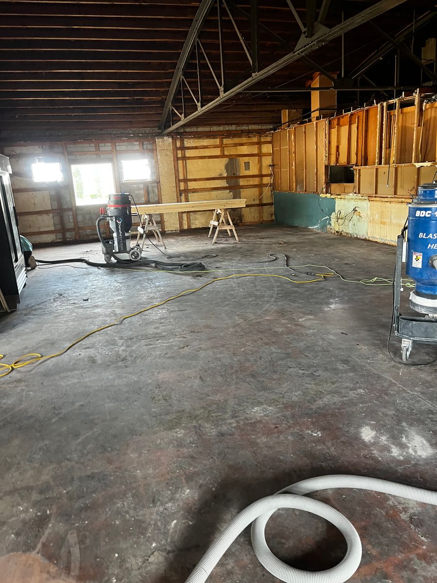 Glue and tile removal/prep work for Twisted X Coatings in Austin, 	Texas