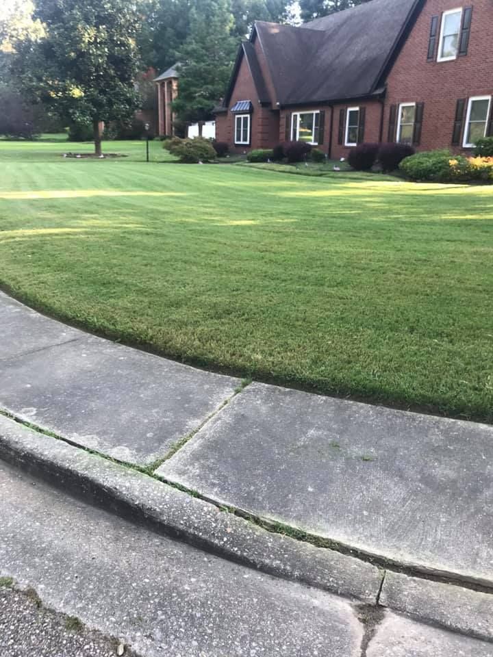 Mowing for Kingdom Landscaping in Memphis, TN