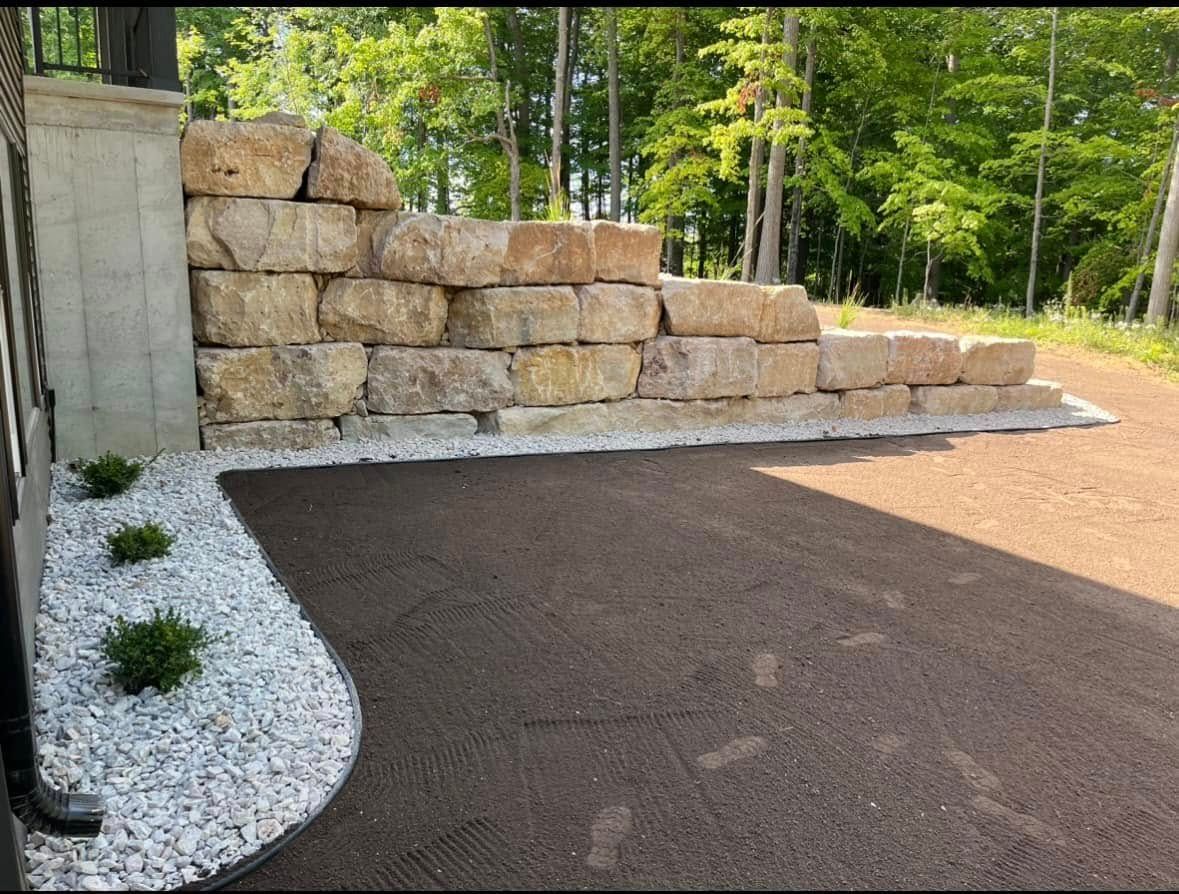 Retaining Wall Construction for Stitch's Landscape in Howard, WI