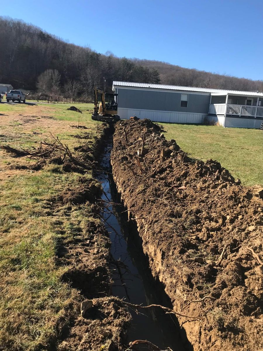 Trenching for Kidd Excavating LLC in West Liberty, KY