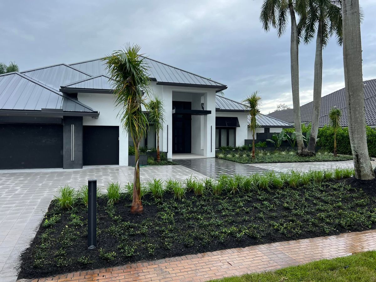 Mulch Installation for An Extravagant Landscape & Lawn Service in Delray, FL