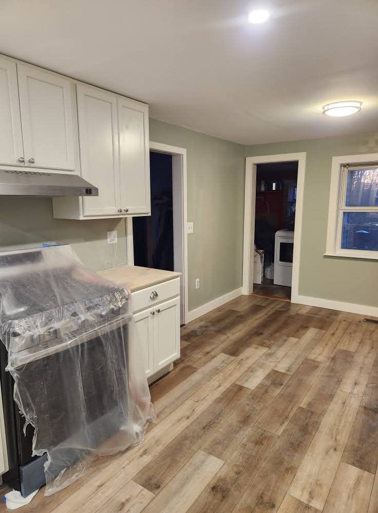 Floor Installation for Murphy's Tech & Trade in Sullivan County, NH