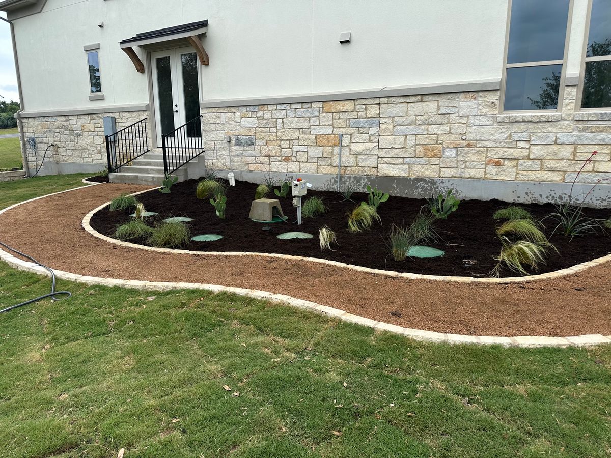 Mulch Installation for Clean Green Landscape Design in Dripping Springs, TX