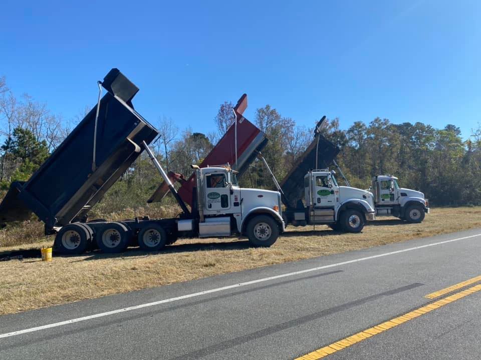 Hauling for Between The Hedges Landscape & Trucking LLC in Altha, FL