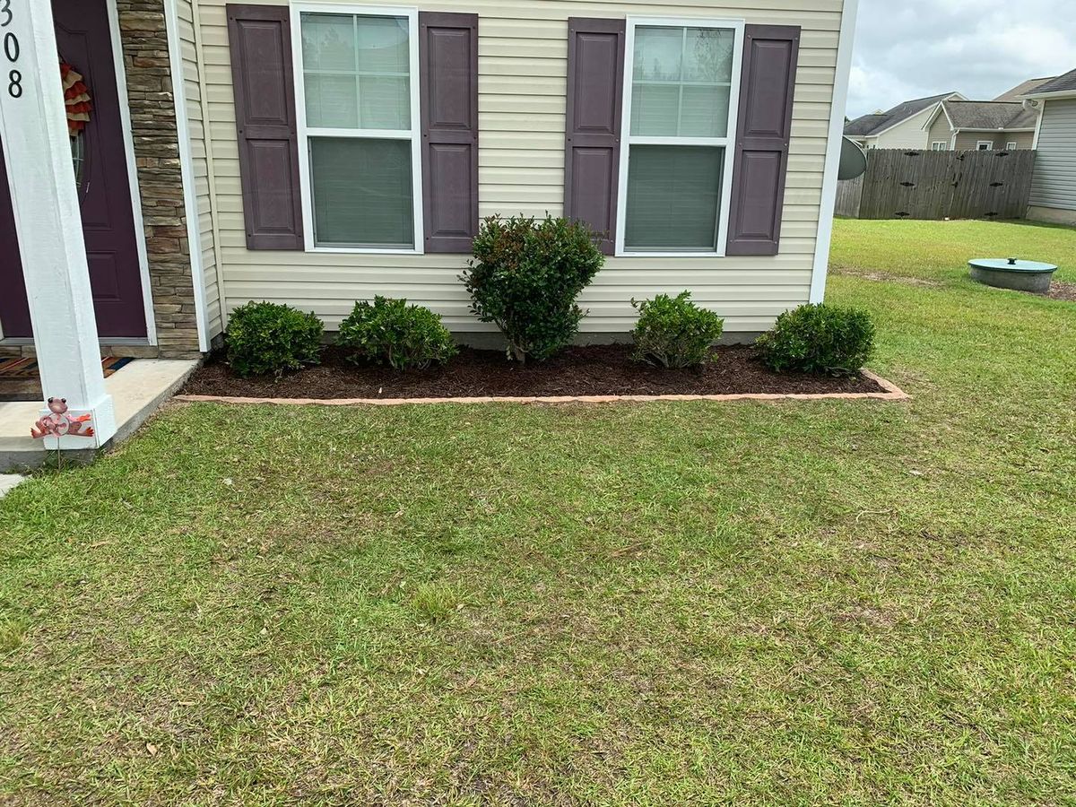 Mulch Installation for NC Lawn Medics, LLC in Jacksonville, North Carolina