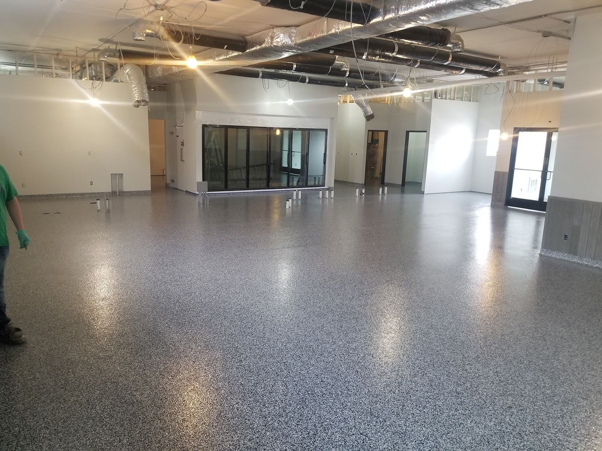 Ployaspartic Chip Coating for Majestic Concrete and Landscape in Cross Lake, MN