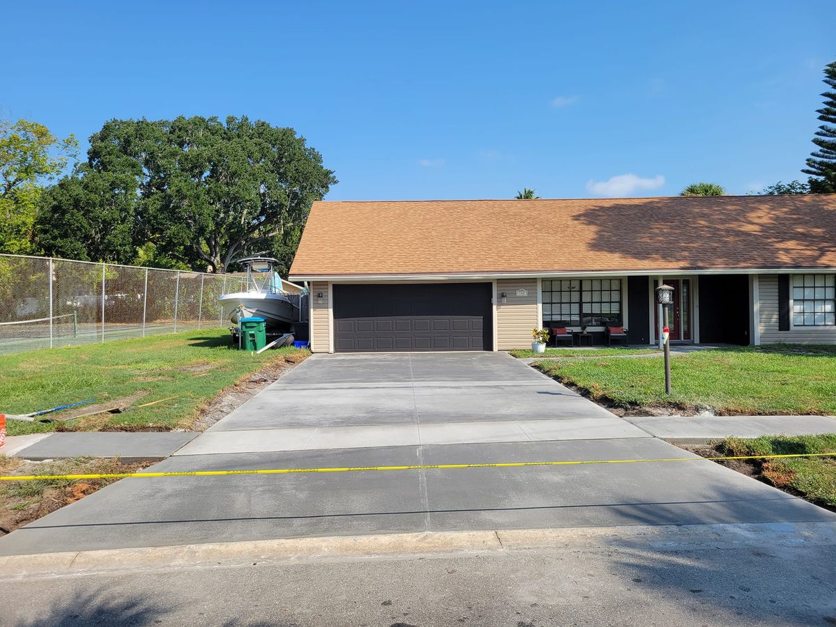 Concrete Driveway Installation for Downer Site Services in Sanford, FL