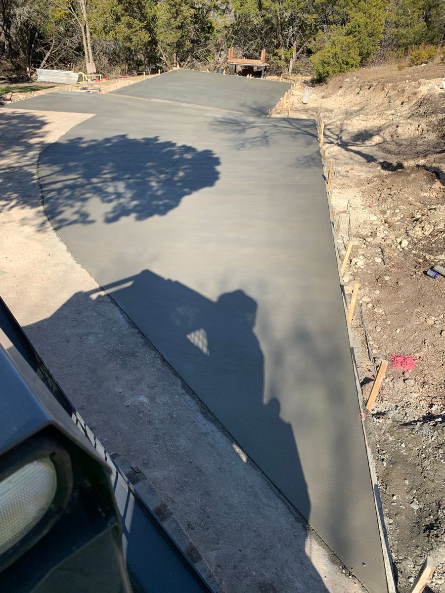Concrete Driveway Installation for Leo's Concrete Crew in Elgin, TX