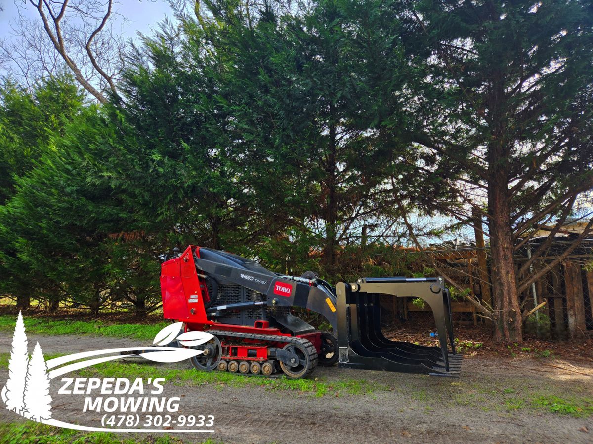 Mini skid steer for Zepeda's Mowing in Fort Valley, GA