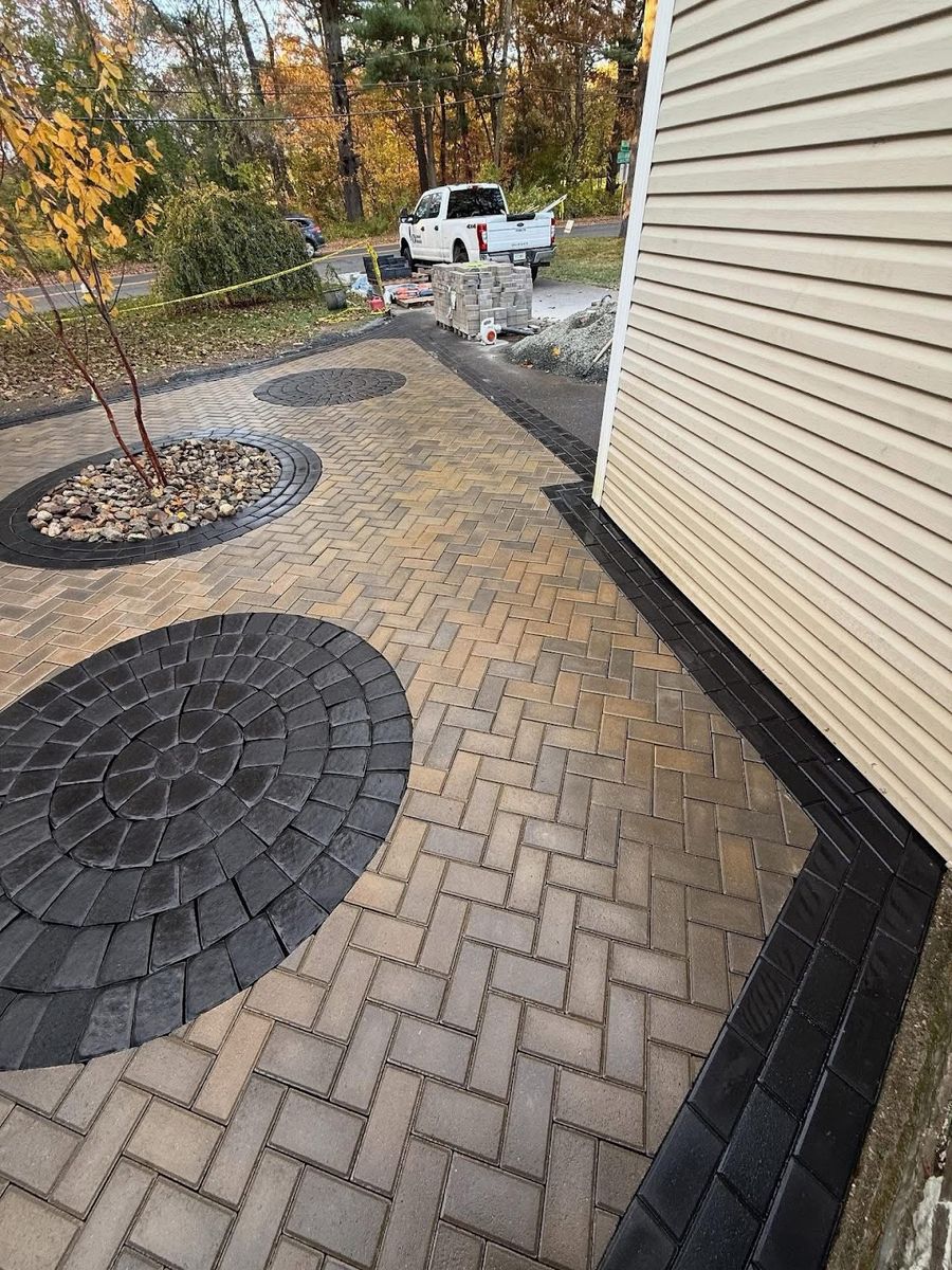 Patio Design & Construction for Elite Pavers and Fencing in Springfield, MA