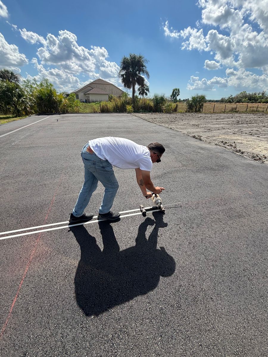 Striping for Stanley & Sons Pavement in Naples, FL