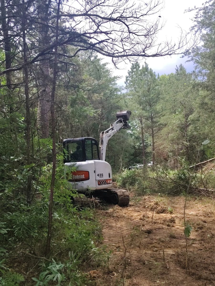 Land Clearing for F.C. White’s Excavation & Drain Cleaning in Huntingdon, TN