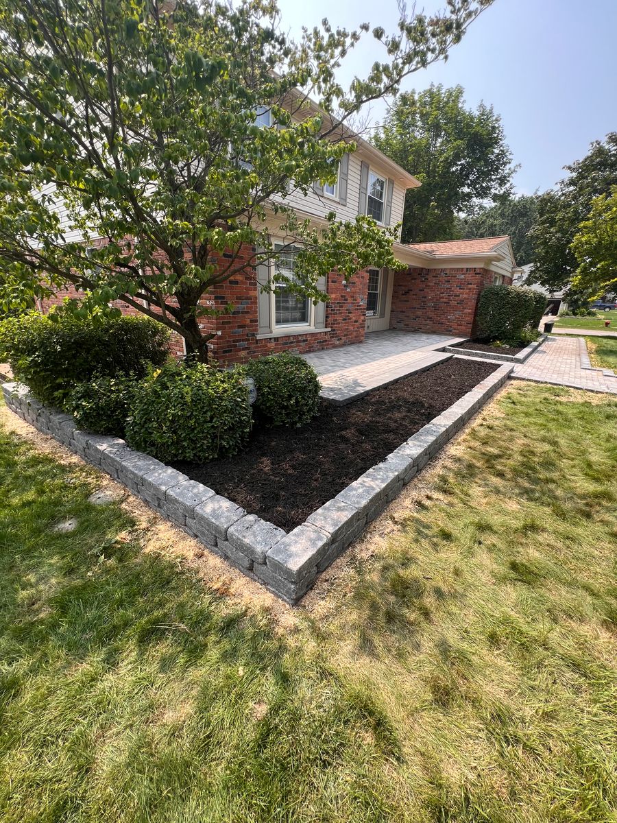 Decorative stone/Mulch Installation for Alltimate Outdoor Services in Warren, MI