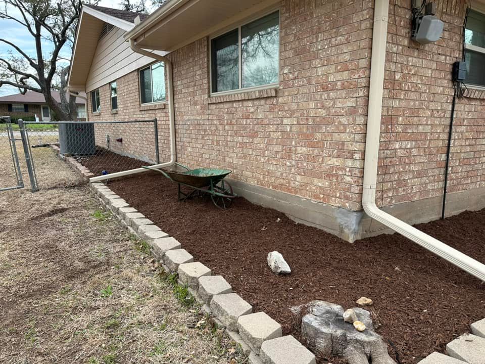 Mulch Installation for Allen Lawn Care in Taylor, Texas