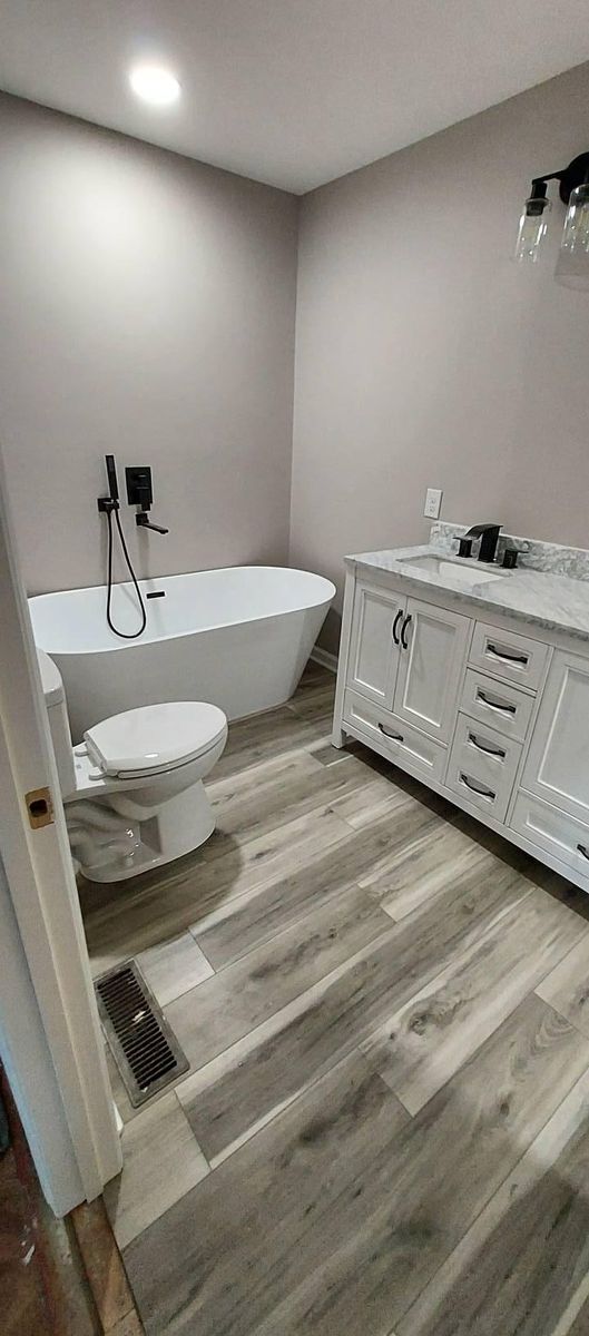 Acrylic Shower & Freestanding Tub Installs for Son of a Journey Remodeling in Dallas, NC