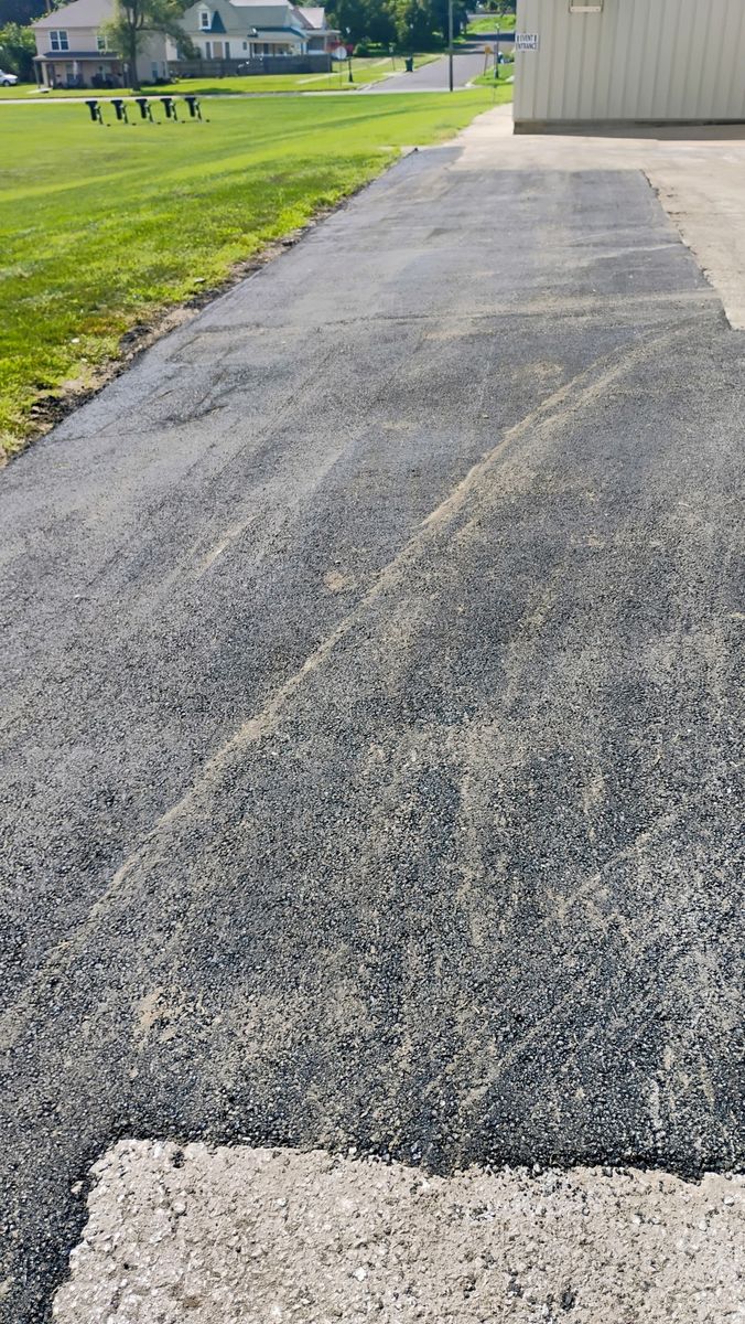 Asphalt Driveway Installation for Bishop Asphalt Sealcoating in Marceline, MO