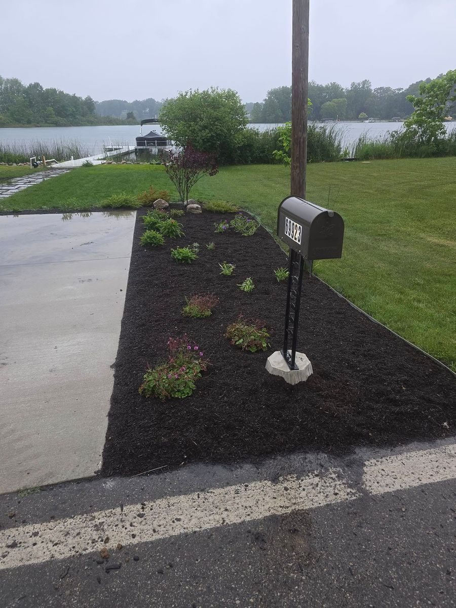 Mulch Installation for Michiana Boulders Landscaping & Excavating in Union, MI