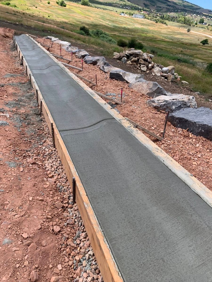 Sidewalk Installation for Diamond Peak Concrete in Garland, UT