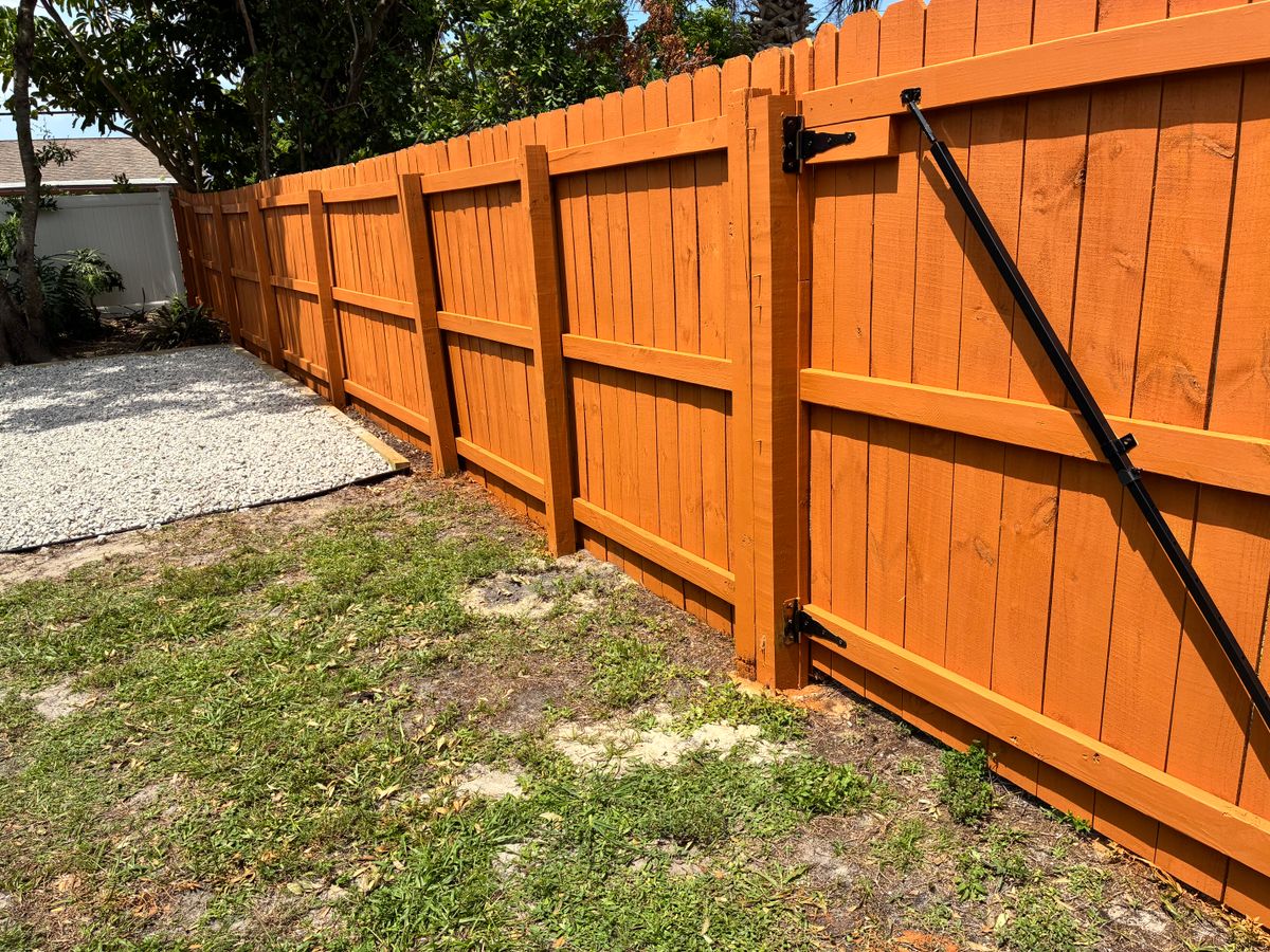 Fence Staining for Paps Painting in Brevard county, FL