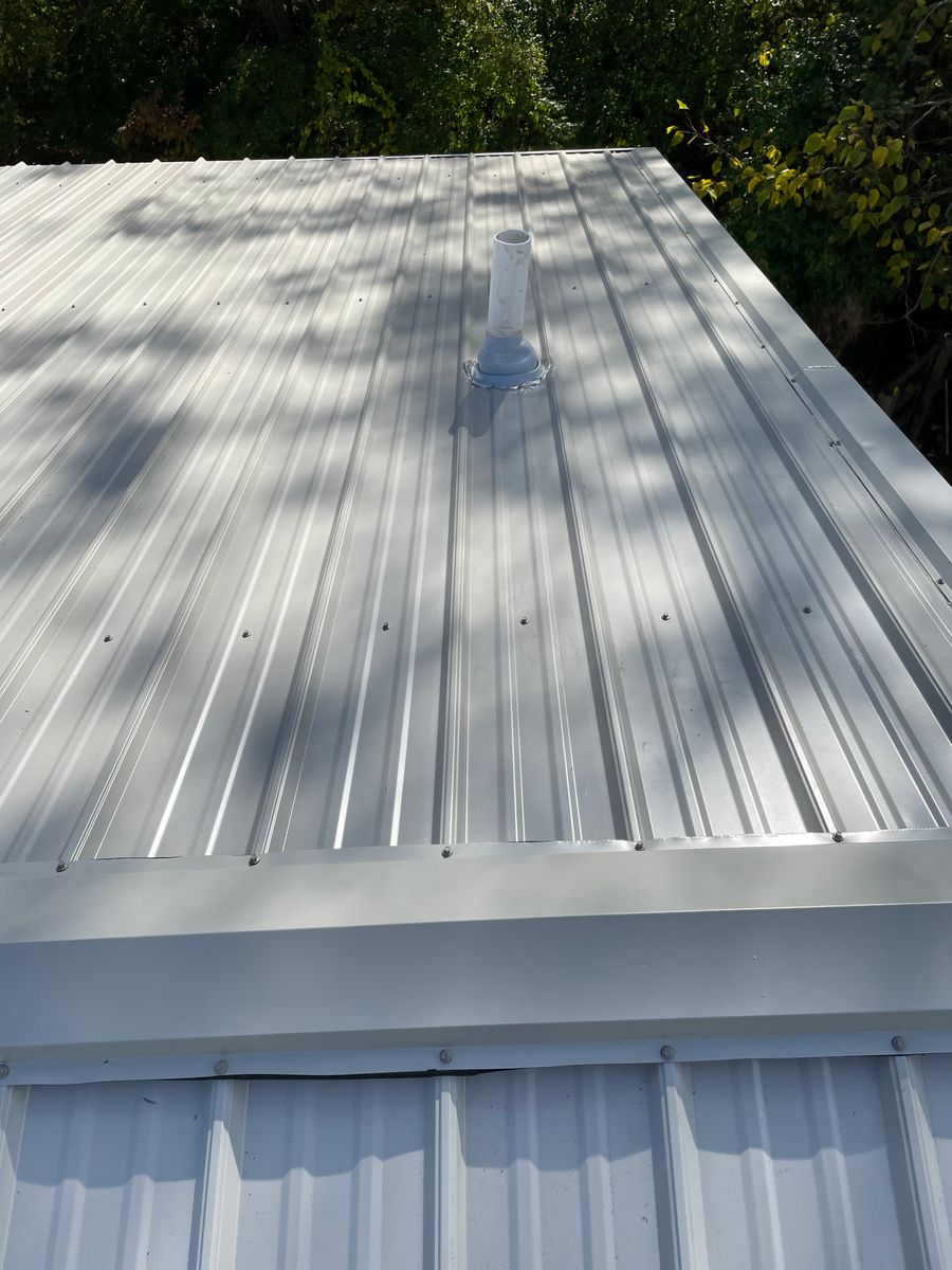 Metal roof installation for Precious Roofing in Madeira, OH