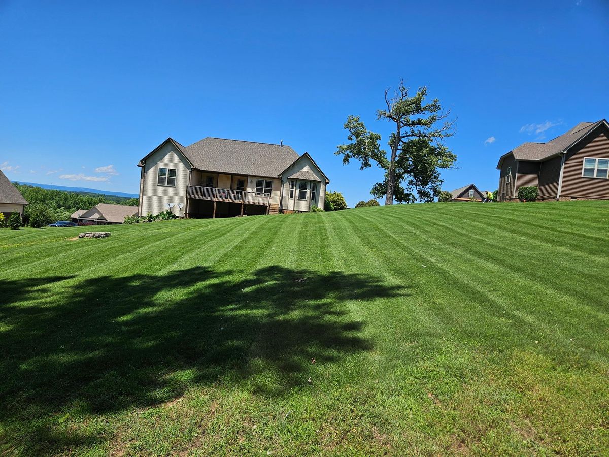 Mowing for Upstate Lawncare Maintenance LLC in Easley, SC