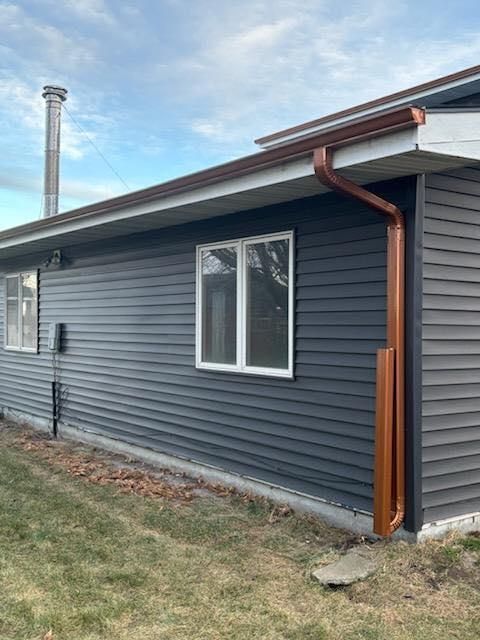 Copper Gutter Installation for The Gutter Man Seamless in Kearney, NE