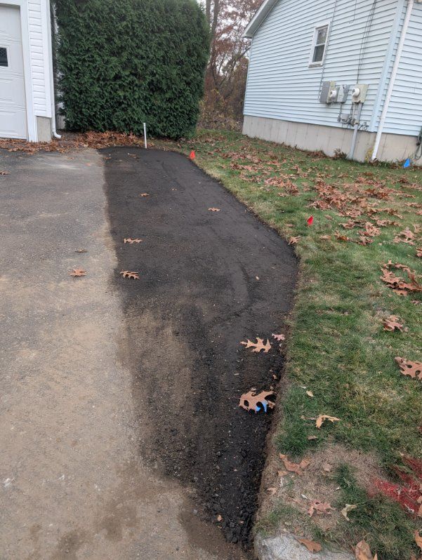 Mulch Installation for Evolution Earthscapes, LLC in Ludlow, MA