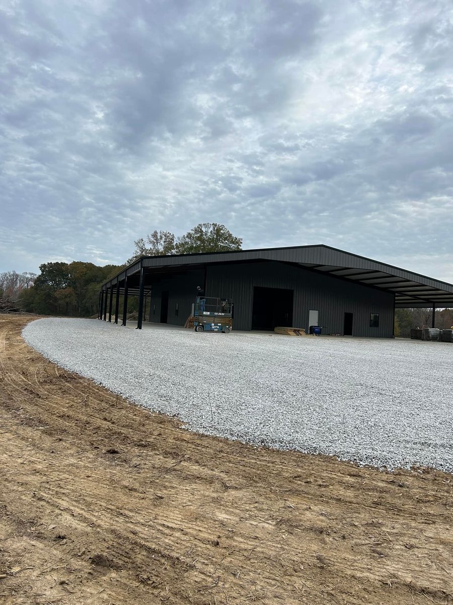 Limestone & Concrete Wash Installation for Lambert Equipment Services in Hessmer, LA