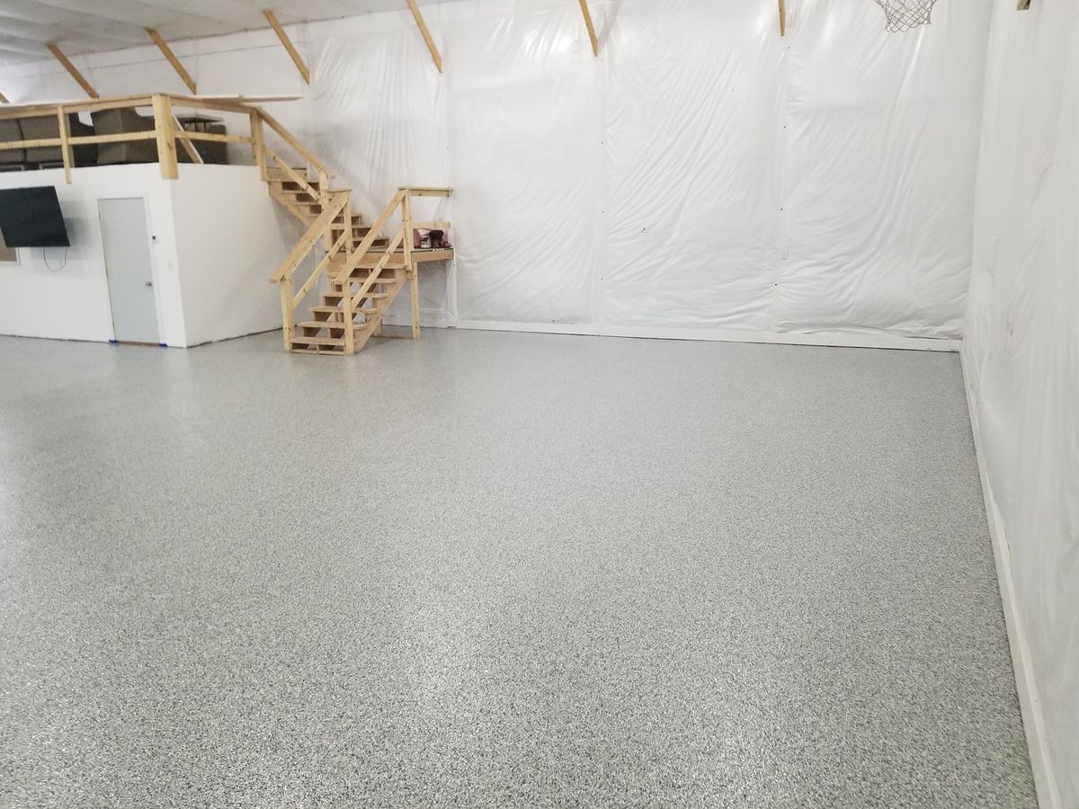 Ployaspartic Chip Coating for Majestic Concrete and Landscape in Cross Lake, MN