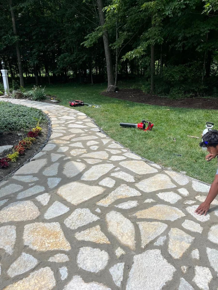 Flagstone Walkway Installation for Higgins landscaping LLC in West Jefferson, OH