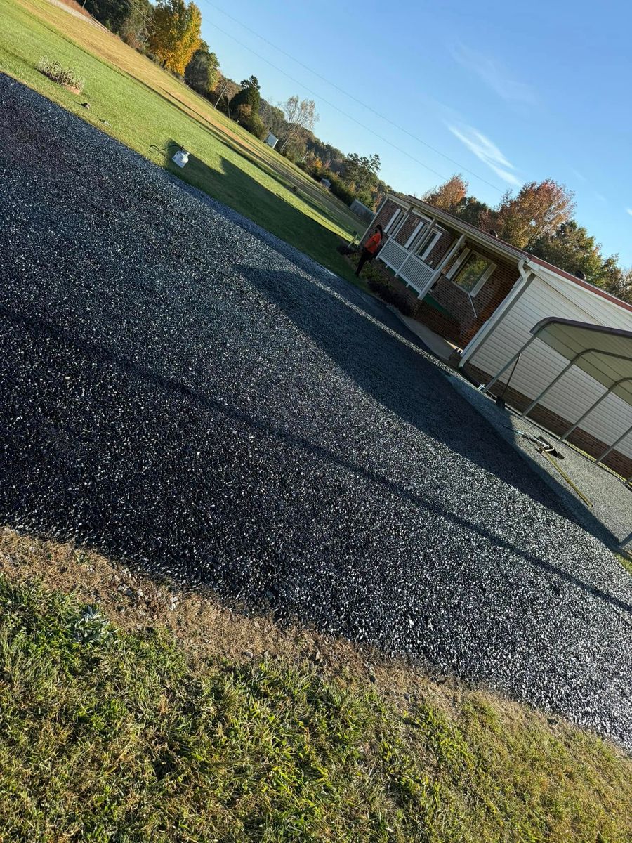 Parking Lot Asphalt Installation for Gus’s Paving and Sealcoating in Lynchburg, VA