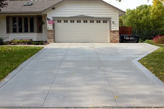 Concrete Driveway Installation for Red Agave Landscape Build & Design in Houston, TX