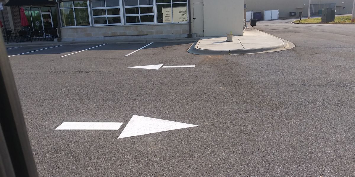 Signage for Stripe A Lot in Knoxville, TN