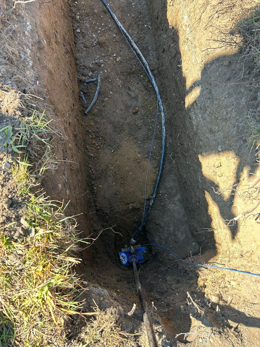 Trenching for Mike Wilcoxson Excavating & Well Drilling in Pierceton,  IN
