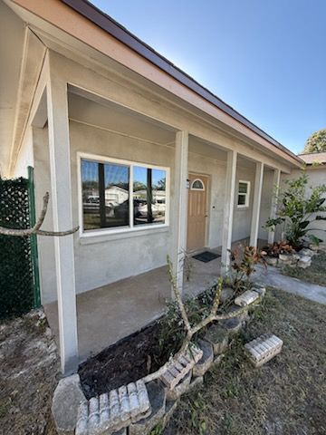 Hardie Siding Installation for Escorpio Painting in Tampa, FL