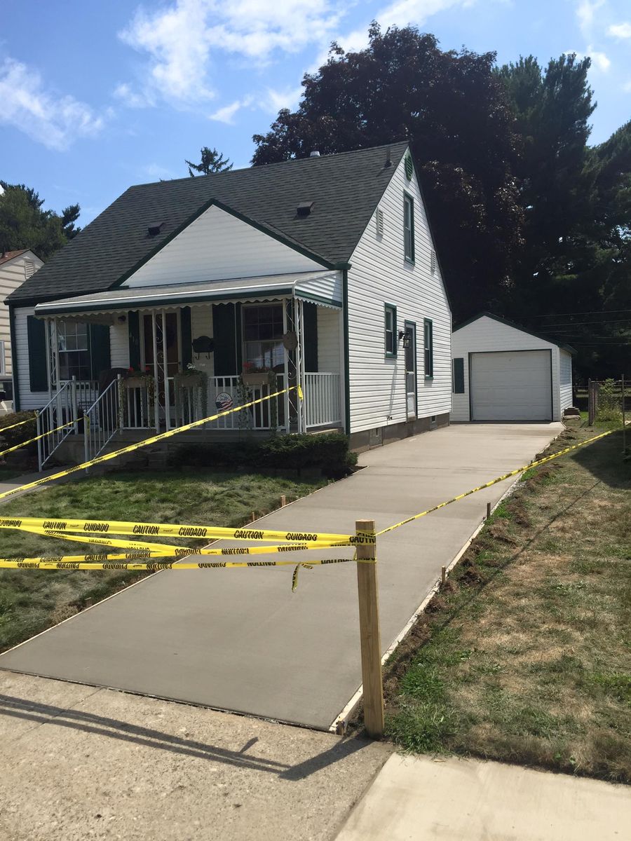 Concrete Sidewalk Installation for Deerbrook Construction in Pontiac, MI