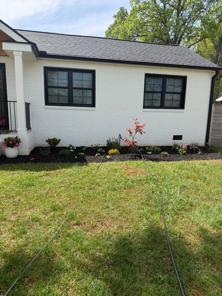 Mulching and pine needling for Holloway Yard Company in Winston-Salem, NC