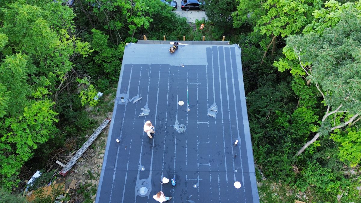 EPDM Roof installation for Precious Roofing in Madeira, OH